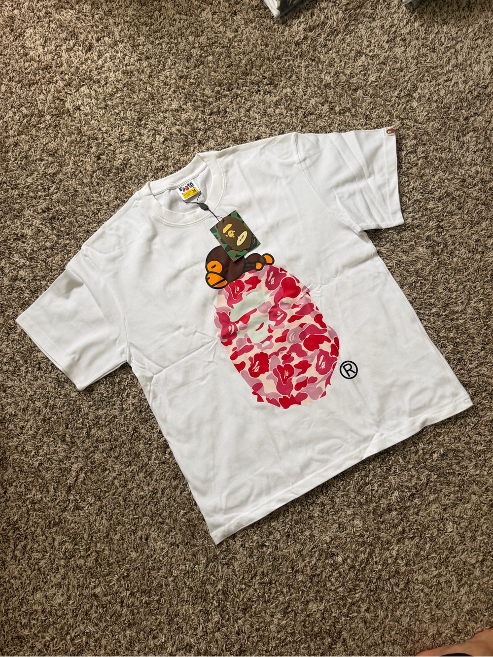 Bape Kids White Tee with Pink Camo Ape Head Graphic